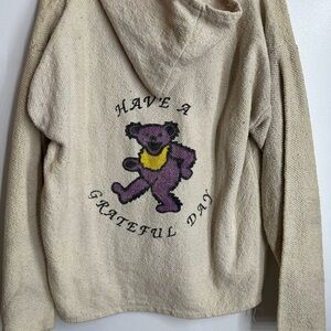 Cream Hoodie with Dancing Bear Design